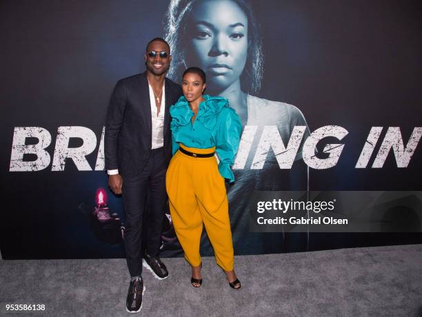 Dwyane Wade and Gabrielle Union arrive to Universal Pictures' special screening of "Breaking In" at ArcLight Cinemas on May 1, 2018 in Hollywood,...