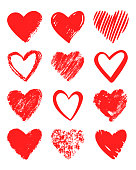 Red vector hand drawn set of different hearts.