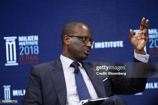Tidjane Thiam, chief executive officer of Credit Suisse Group AG, gestures as he speaks during the Milken Institute Global Conference in Beverly...