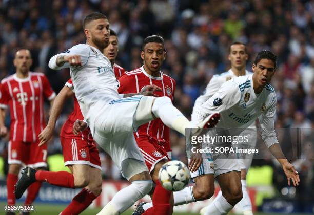 Sergio Ramos and Corentin Tolisso competes for the ball during the UEFA Champions League Semi Final Second Leg match between Real Madrid and Bayern...