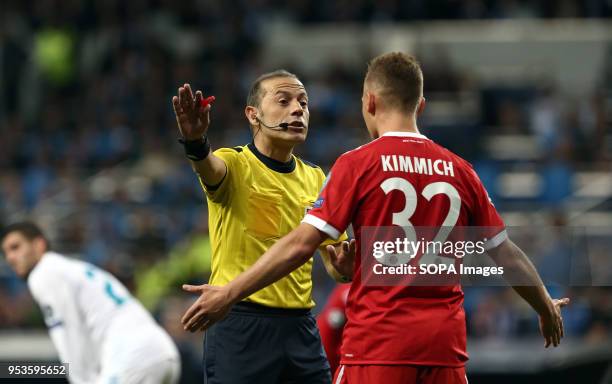 Joshua Kimmich protest to referee during the UEFA Champions League Semi Final Second Leg match between Real Madrid and Bayern Munchen at the Santiago...