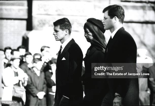 In Arlington National Ceremony, Jacqueline Kennedy , accompanied by her brothers-in-law US Attorney General Robert F Kennedy and Ted Kennedy ,...