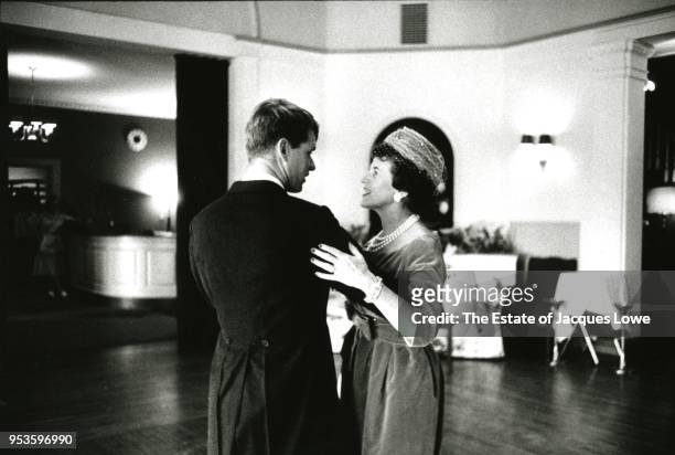 View of Robert F Kennedy as he dances with his mother, Rose Kennedy , Bronxville, New York, November 29, 1958. They were attending the wedding of the...
