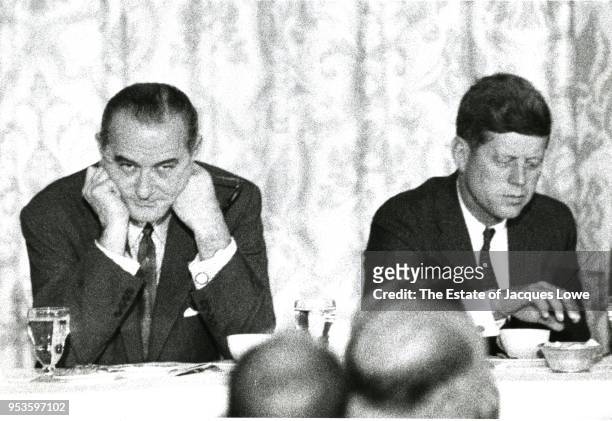 View of American politicians US Senators Lyndon B Johnson and John F Kennedy as they sit beside one another during a Democratic National Convention...