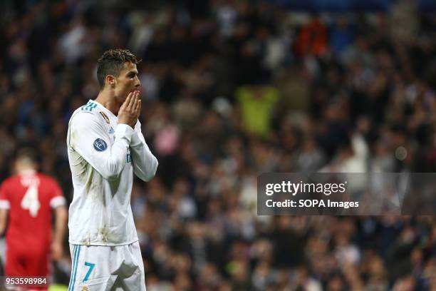 Cristiano Ronaldo reacts during the UEFA Champions League Semi Final Second Leg match between Real Madrid and Bayern Munchen at the Santiago...