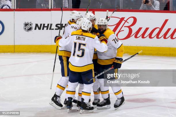 Ryan Johansen, Craig Smith, Viktor Arvidsson, Filip Forsberg and P.K. Subban of the Nashville Predators celebrate a third period goal against the...