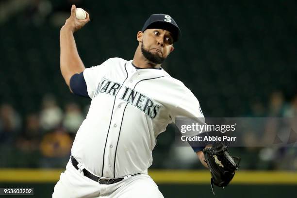 Juan Nicasio of the Seattle Mariners pitches in the eighth inning against the Oakland Athletics at Safeco Field on May 1, 2018 in Seattle, Washington.