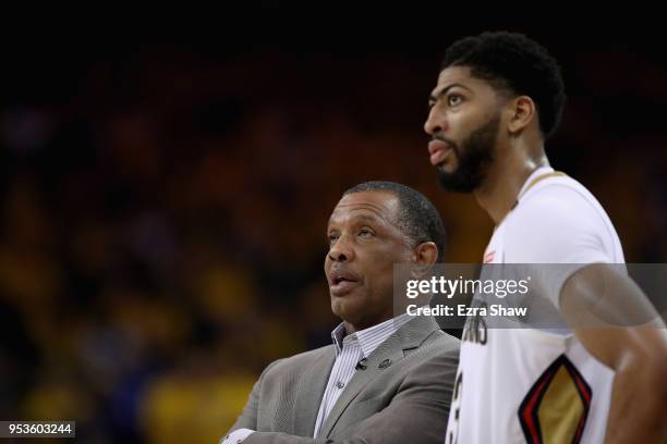 Anthony Davis of the New Orleans Pelicans stands with head coach Alvin Gentry during their game against the Golden State Warriors in Game Two of the...