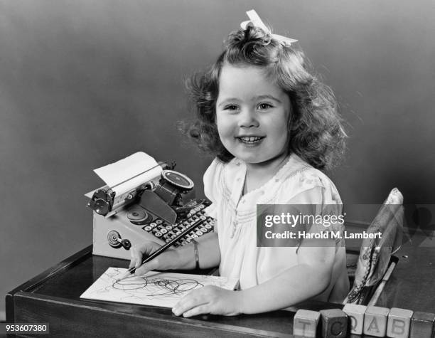 Girl Using Typewriter 312 Typewriter Girl Stock Photos, High-Res Pictures, and Images - Getty ...