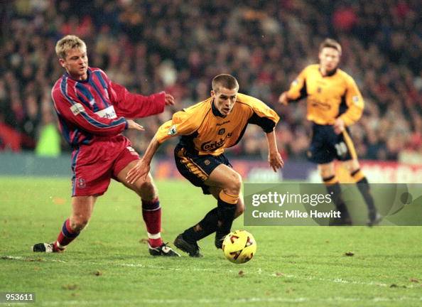 Simon Rugen Liverpool Michael Owen of Liverpool evades the challenge of Simon Rodger of ...