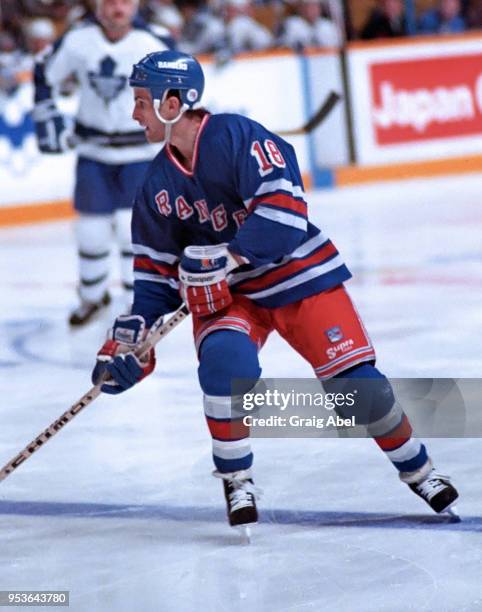 Tony Granato of the New York Rangers skates against the Toronto Maple Leafs during NHL game action on January 28, 1989 at Maple Leaf Gardens in...