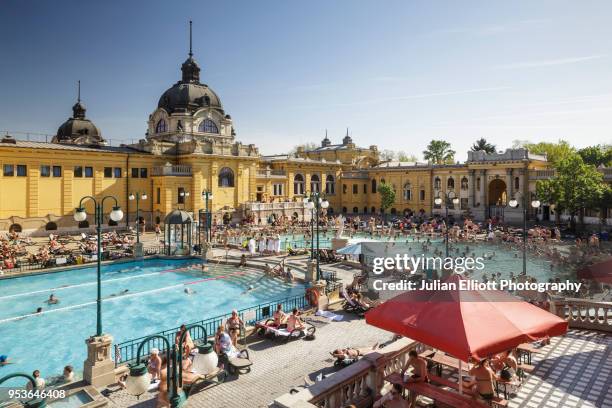 the szechenyi thermal bath in budapest, hungary. - thermal pool stock pictures, royalty-free photos & images