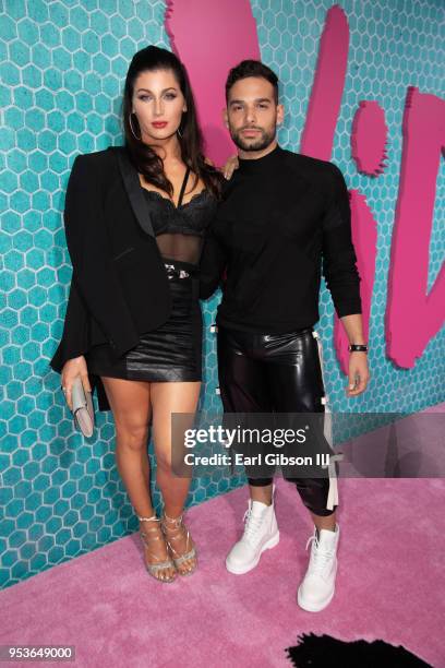 Trace Lysette and Johnny Sibilly attend Starz "Vida" Premiere at Regal LA Live Stadium 14 on May 1, 2018 in Los Angeles, California.