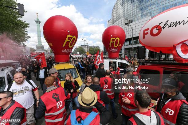 French workers union Force Ouvriere members takes part in a march in Paris during the annual May Day worker's rally on May 1 in front of the Opera...