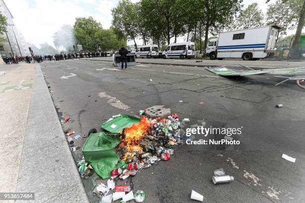 Burning bin during the march for the annual May Day workers' rally, in Paris, on May 1, 2018. Police in Paris have used water cannons to break up a...