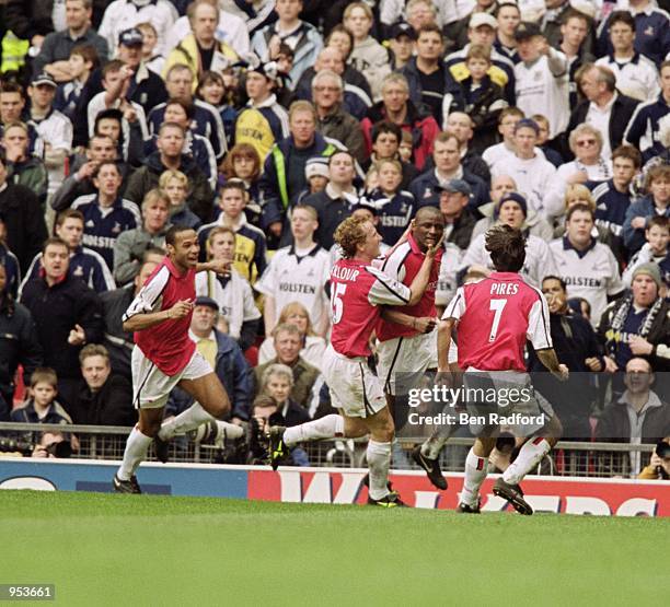 Arsenal players Thierry Henry, Ray Parlour and Robert Pires help celebrate Patrick Vieira goal during the AXA sponsored FA Cup semi-final match...