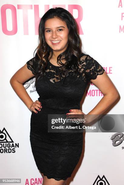 Amber Romero arrives for a luncheon in honor of Mother's Day for the release of Pamela L. Newton's "A Candle For My Mother" held at Los Angeles Film...