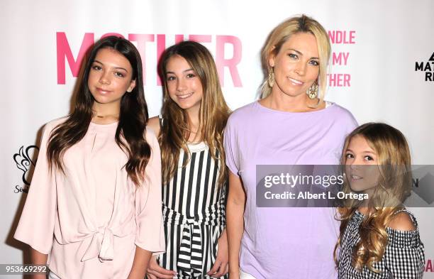 Kaylee Quinn, Rihanna Quinn and Coco Quinn pose with mother Jeannie Quinn at a luncheon in honor of Mother's Day for the release of Pamela L....