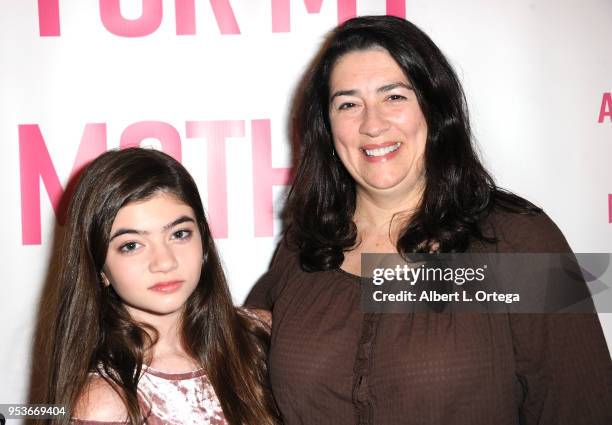Samantha Gangal poses with her mother Kendra Gangal at a luncheon in honor of Mother's Day for the release of Pamela L. Newton's "A Candle For My...