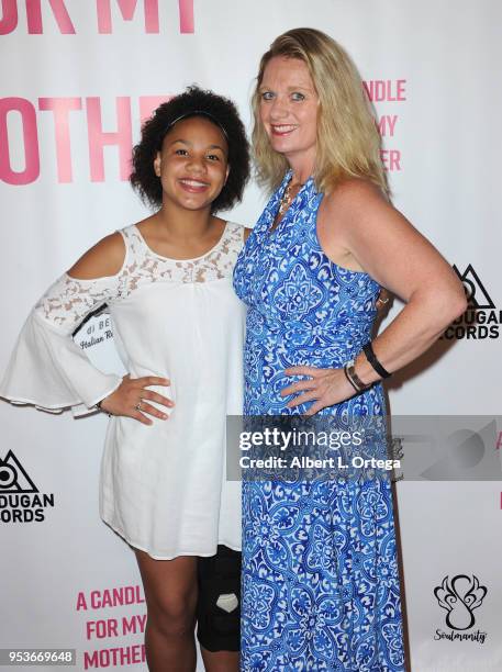 Jillian Estell poses with her mother Kristin Estell at a luncheon in honor of Mother's Day for the release of Pamela L. Newton's "A Candle For My...