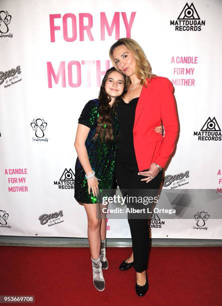 Abigail Haley poses with her mother Alexis Blinder a luncheon in honor of Mother's Day for the release of Pamela L. Newton's "A Candle For My Mother"...