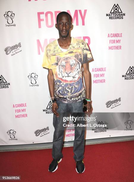 Justin Johnson arrives for a luncheon in honor of Mother's Day for the release of Pamela L. Newton's "A Candle For My Mother" held at Los Angeles...