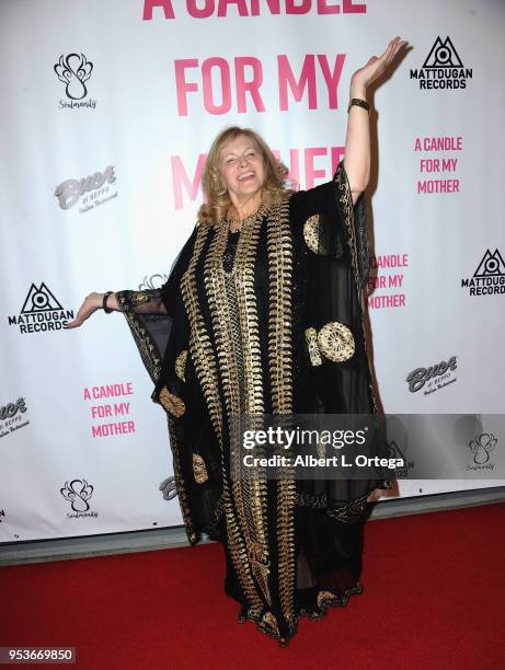 Author Pamela L. Newton arrives for a luncheon in honor of Mother's Day for the release of Pamela L. Newton's "A Candle For My Mother" held at Los...