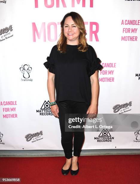 Writer/producer Stacey Healey arrives for a luncheon in honor of Mother's Day for the release of Pamela L. Newton's "A Candle For My Mother" held at...