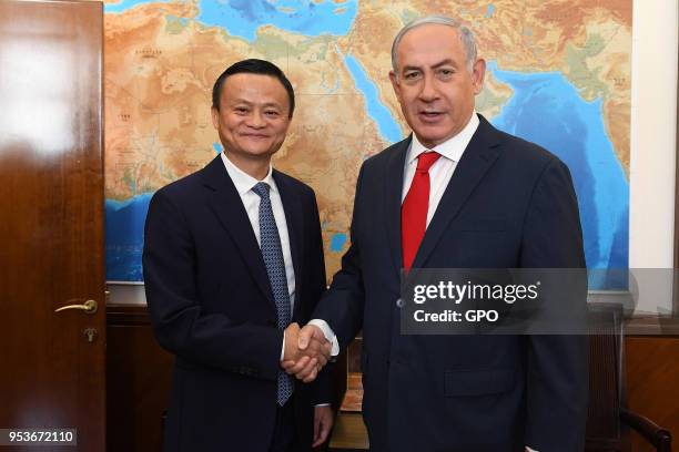 In this handout image supplied by the Israeli government press office , Alibaba CEO Jack Ma meets Israeli Prime Minister Benjamin Netanyahu on May 2,...