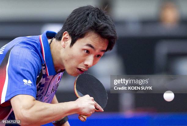 South Korea's Joo Se Hyuk returns the ball against Germany's Patrick Baum during their men's singles 3rd-round match at the 2011 World Table Tennis...