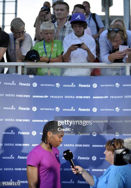 South African athlete Caster Semenya answers to journalists in Lappeenranta, Eastern Finland on July 15, 2010 for her first start since the Berlin...