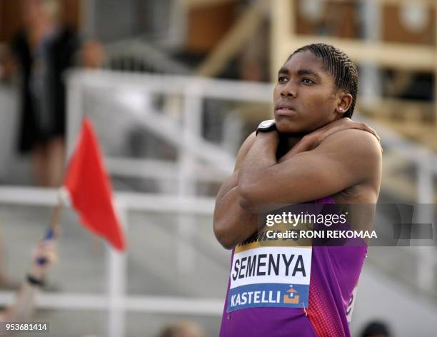 South African athlete Caster Semenya gets ready prior to compete in the women's 800m race in Lappeenranta, Eastern Finland on July 15, 2010 for her...