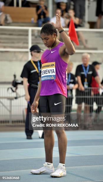 South African athlete Caster Semenya gets ready prior to compete in the women's 800m race in Lappeenranta, Eastern Finland on July 15, 2010 for her...