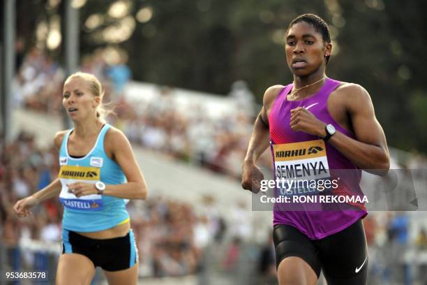 South African athlete Caster Semenya winas as she competes in the women's 800m race in Lappeenranta, Eastern Finland on July 15, 2010 for her first...