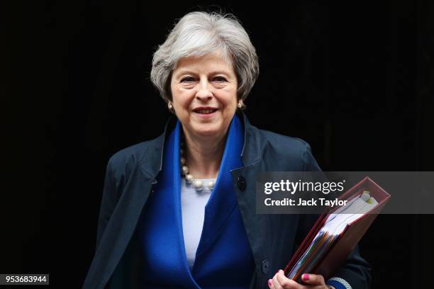 British Prime Minister Theresa May leaves 10 Downing Street to attend Prime Minister's Questions at the Houses of Parliament on May 2, 2018 in...