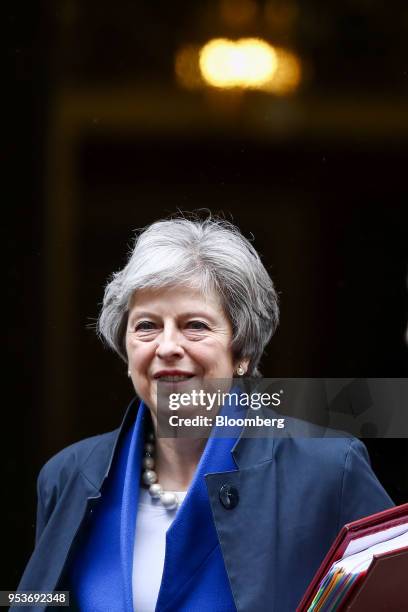 Theresa May, U.K. Prime minister, departs number 10 Downing Street to attend a weekly questions and answers session in Parliament in London, U.K., on...