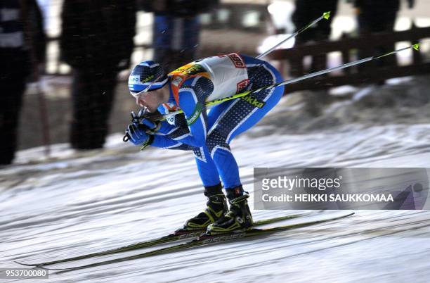 Finland's Janne Ryynanen competes during the men's Nordic Combined individual Gundersen 10 km race of the FIS World Cup Ruka Nordic Opening in...