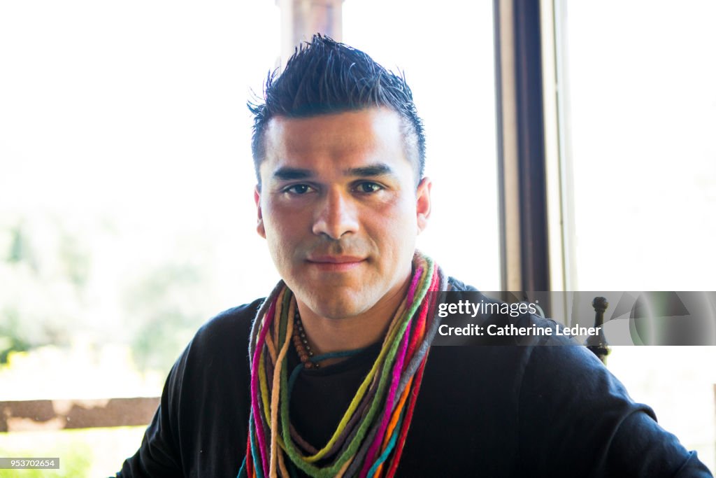 Portrait of handsome man with colorful necklace