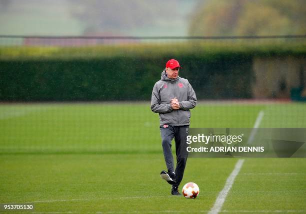 Arsenal's French manager Arsene Wenger takes part in a training session at the club's complex in London Colney on May 2, 2018 on the eve of their...