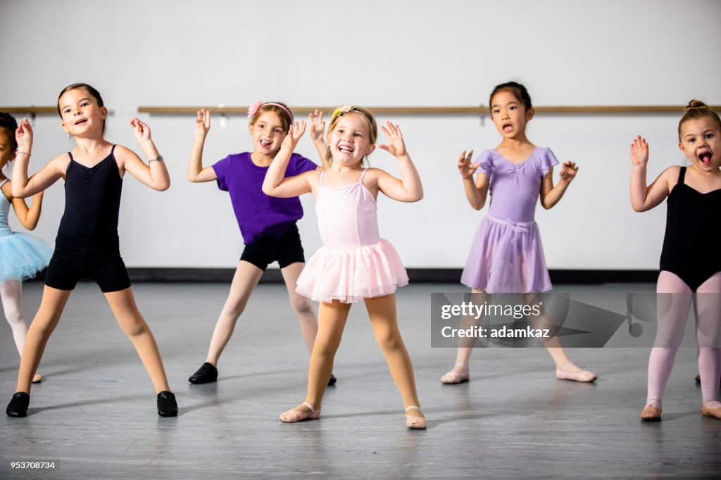 Lined Up Diverse Young Students in Dance Class