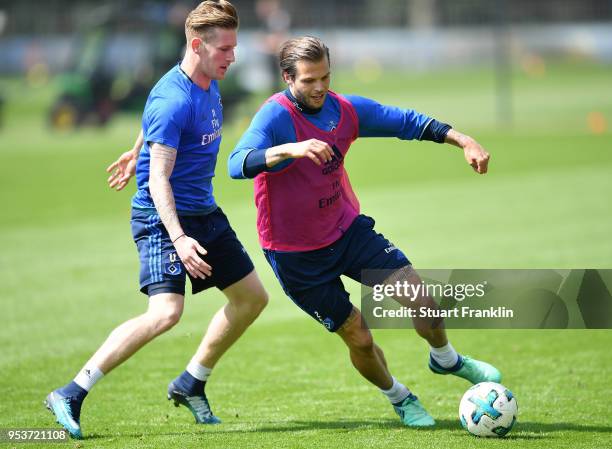 Dennis Diekmeier and Andr Hahn in action during the training session of Hamburger SV at Volksparkstadion on May 2, 2018 in Hamburg, Germany.