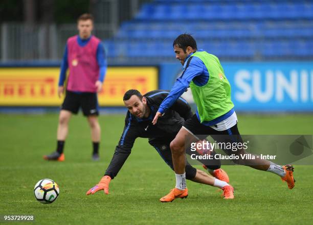 Citadin Martins Eder and Samir Handanovic of FC Internazionale compete for the ball during the FC Internazionale training session at the club's...