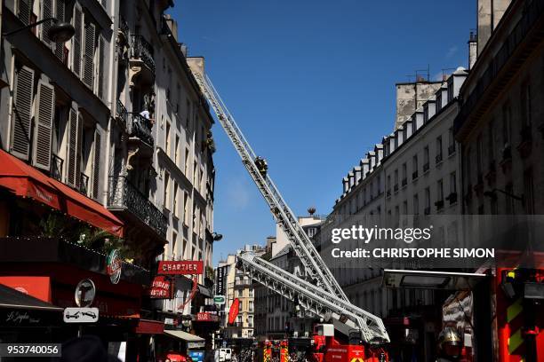 Firemen are at work in Paris, on May 2, 2018 in Paris.