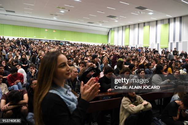 Students react during a general assembly in Nanterre University, west of Paris on May 2, 2018. - Students of Nanterre University voted, on May 2,...