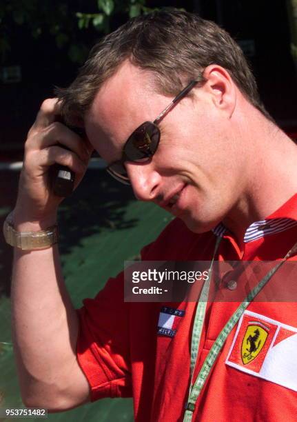 Irish Ferrari driver Eddie Irvine looks pensive, 24 June 1999 in the paddocks, three days before the 85th French Formula One Grand Prix in...
