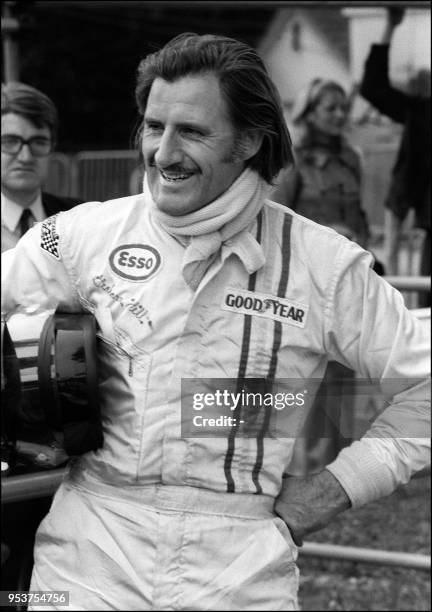 Graham Hill of Britain smiles 27 June 1971 after the Grand Prix in the western French city of Rouen.