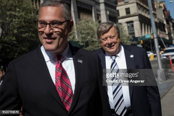 Viktor Knavs , father of U.S. First Lady Melania Trump, arrives with lawyer Michael Wildes at U.S. Citizenship and Immigration Services at the Jacob...