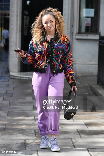 Ella Eyre seen leaving KISS FM UK in the sunshine on May 2, 2018 in London, England.