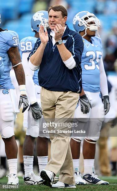 Head coach Butch Davis of the North Carolina Tar Heels yells to his team before their game against the Pittsburgh Panthers on December 26, 2009 in...
