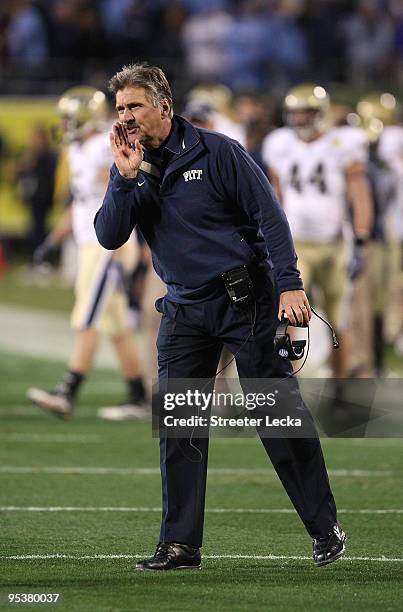 Head coach Dave Wannstedt of the Pittsburgh Panthers yells to his team against the North Carolina Tar Heels on December 26, 2009 in Charlotte, North...